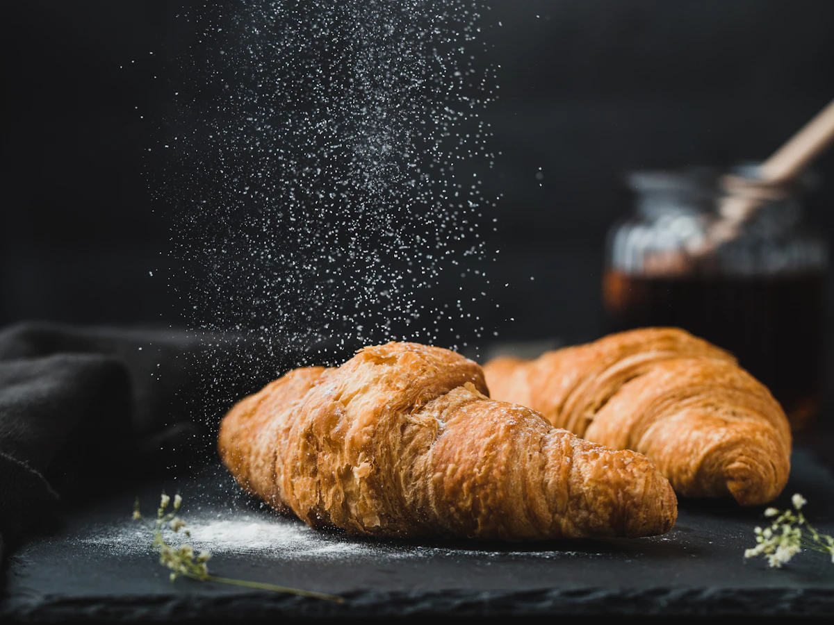 Golden croissants, stock photo illustration